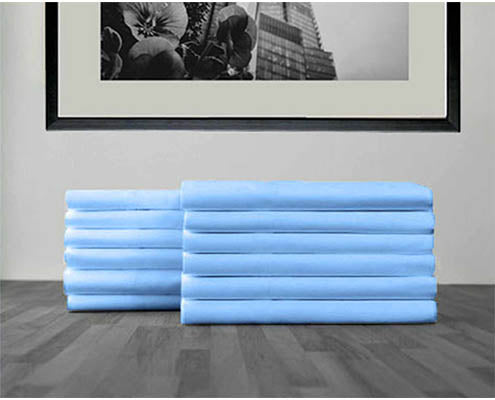 pile of light blue coloured pillowcases
